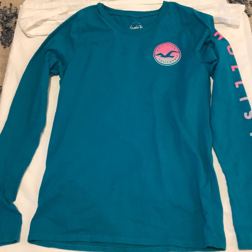 This is a blue long sleeve shirt